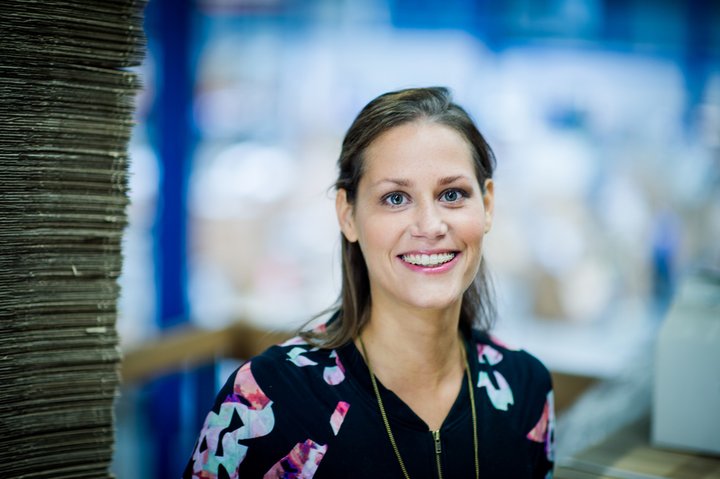 Woman with brown hair smiling