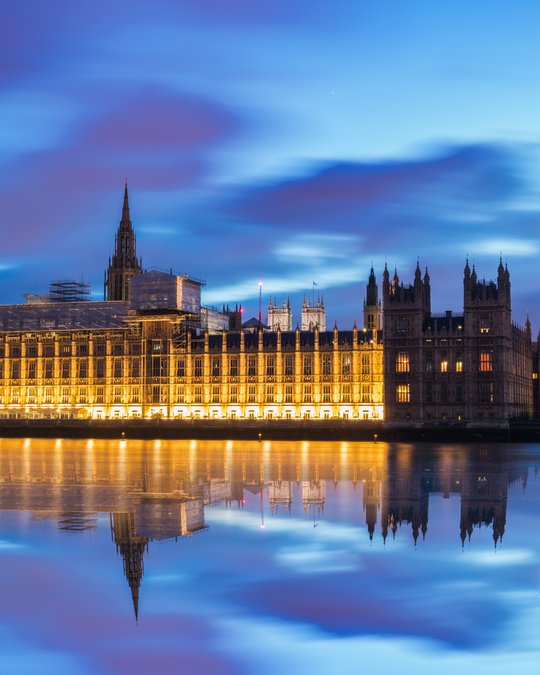 Big Ben and Palace of Westminster at dusk in London. England