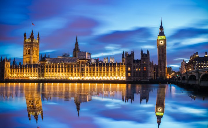 Big Ben and Palace of Westminster at dusk in London. England