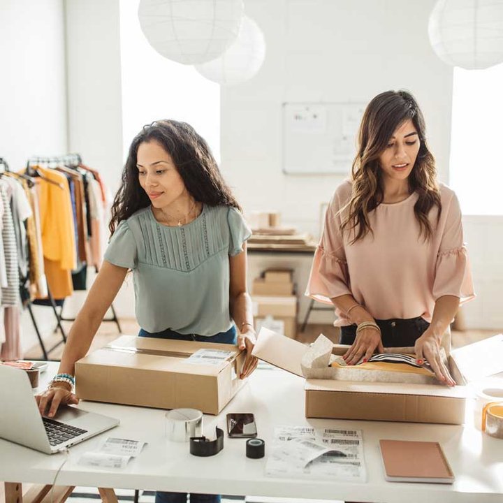 women working on their webshop